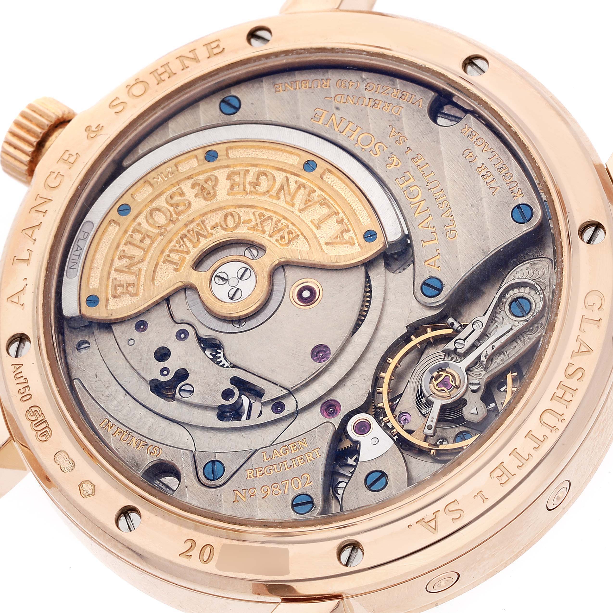 The image shows the back view of the A. Lange & Sohne Saxonia 330.032 Men's Rose Gold Silver Dial, displaying its intricate movement components.