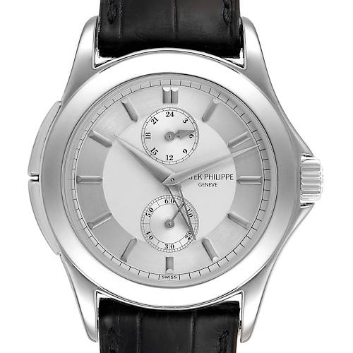 The image shows a front view of the Patek Philippe Calatrava 5134P Men's Platinum Silver Dial 5134P Men's Platinum Silver Dial watch, highlighting the dial, hands, subdials, bezel, and strap attachment.
