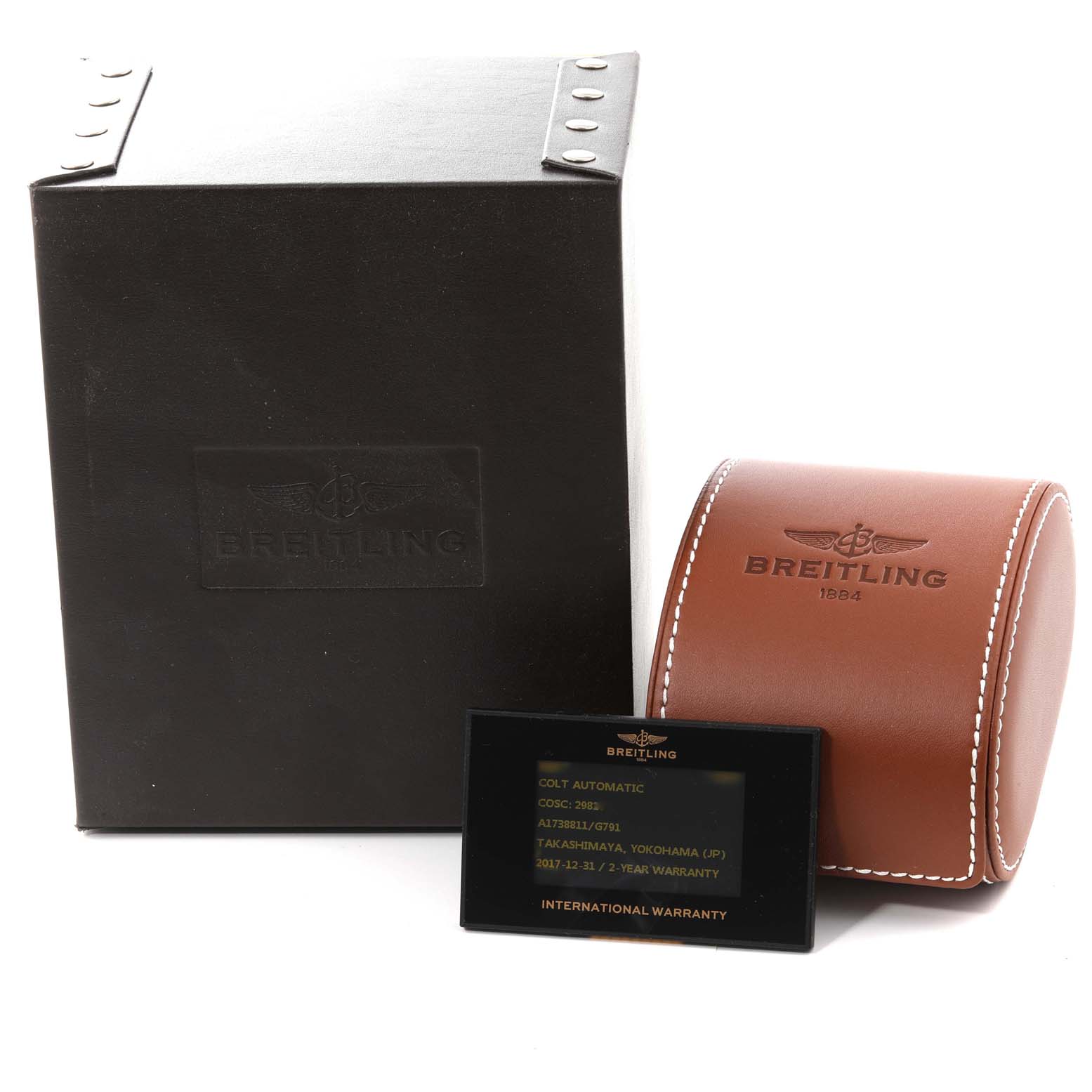 This image shows the Breitling Colt A1738811/G791 Men's Stainless Steel White Dial A1738811/G791 Men's Stainless Steel White Dial watch box, leather case, and an international warranty card.