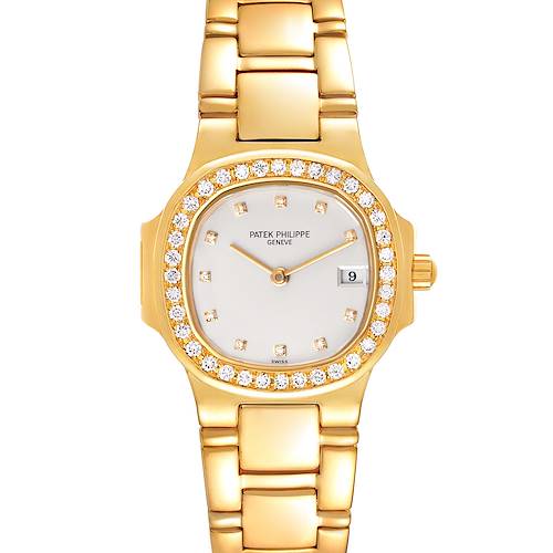 The image shows the front view of a Patek Philippe Nautilus 4700/530 Women's Yellow Gold Beige Dial 4700/530 Women's Yellow Gold Beige Dial watch, highlighting its gold bracelet, diamond bezel, and date window.