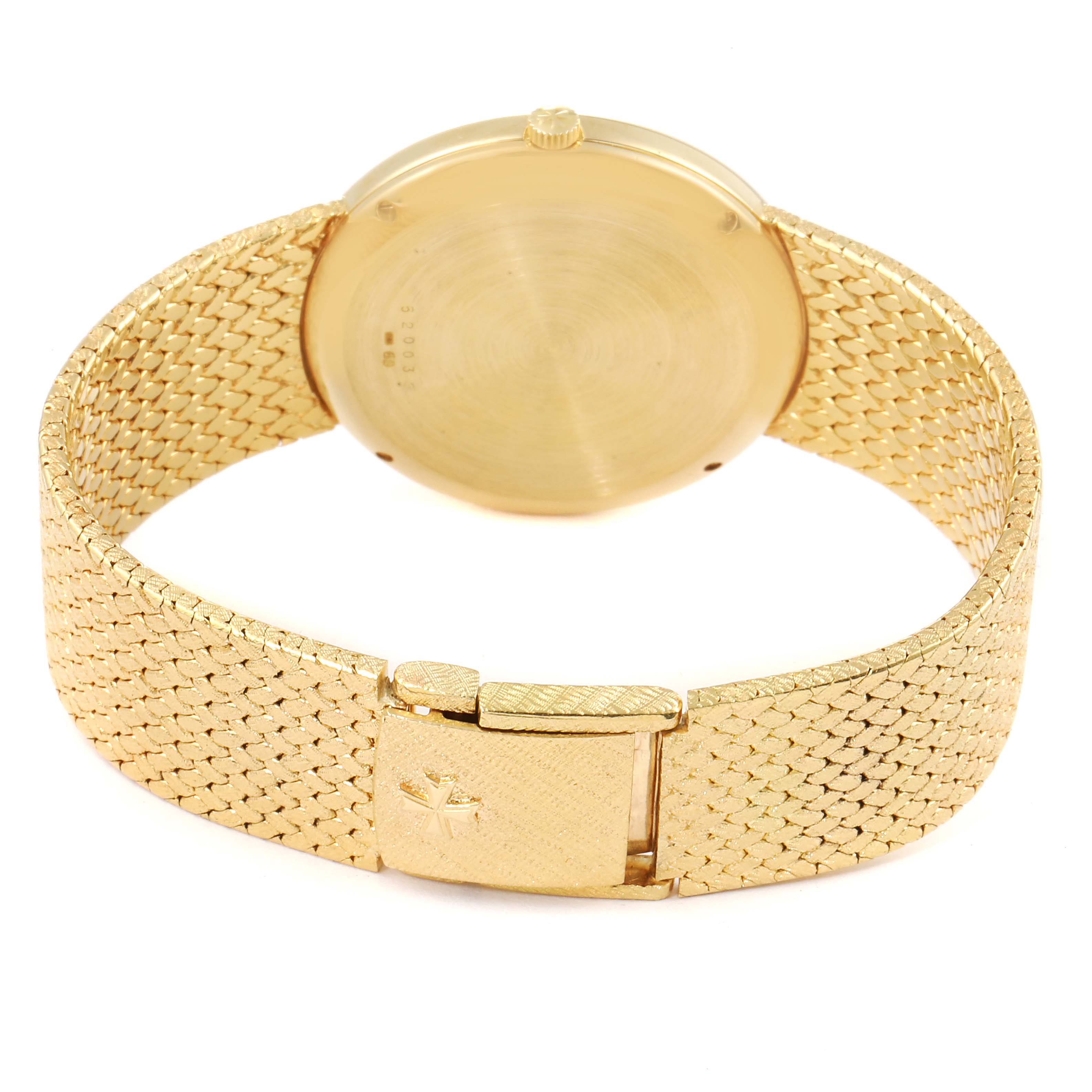 The image shows the backside and clasp of a Vacheron Constantin Patrimony 44012 Men's Yellow Gold Champagne Dial 44012 Men's Yellow Gold Champagne Dial watch in gold.