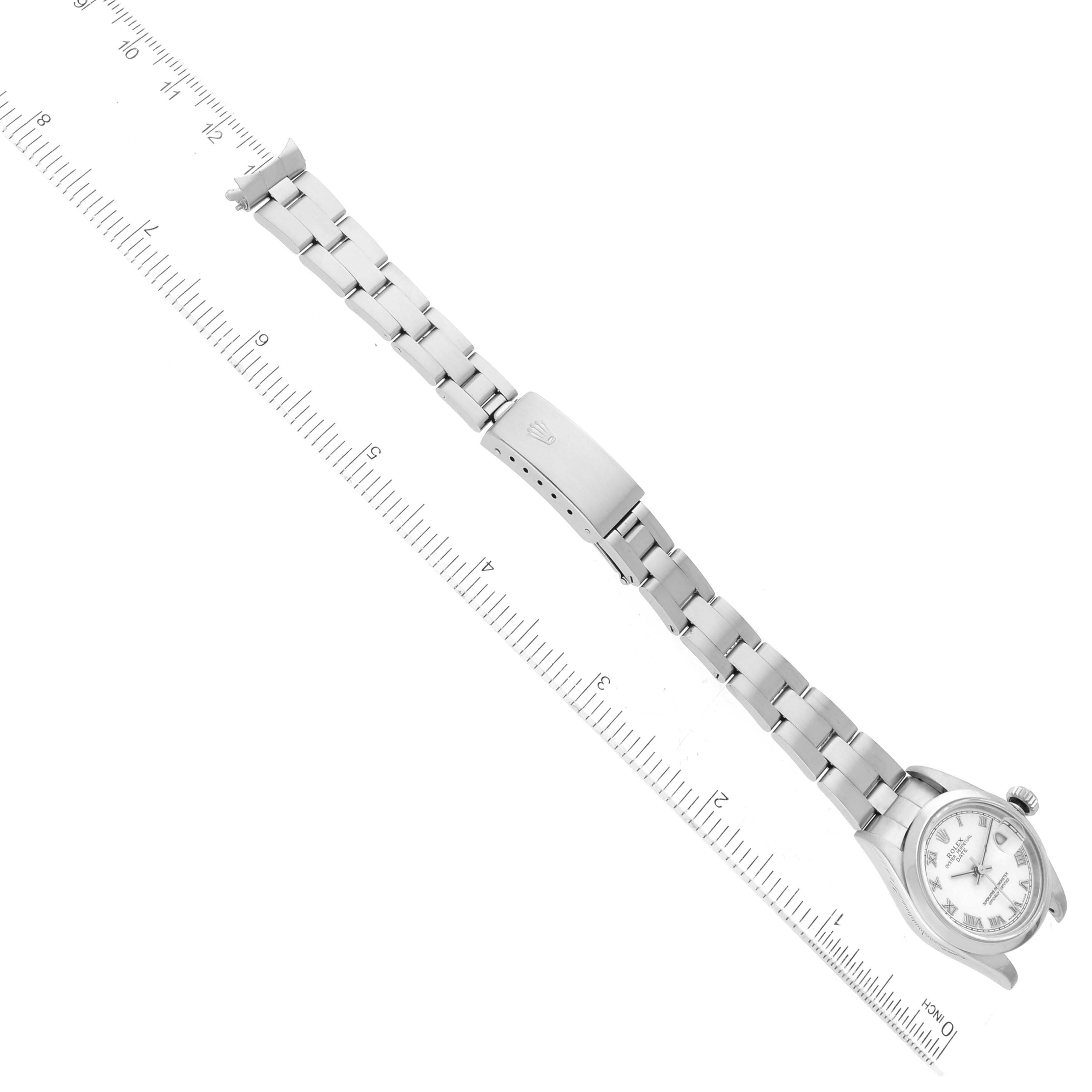 This image shows a top-down view of a Rolex Date 79160 Women's Stainless Steel White Dial 79160 Women's Stainless Steel White Dial model watch, displaying the full length of the watch including the bracelet and clasp.