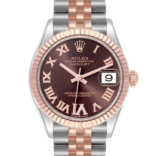 The Rolex Datejust watch is shown from a front angle, displaying its dial, bezel, crown, and part of the bracelet.