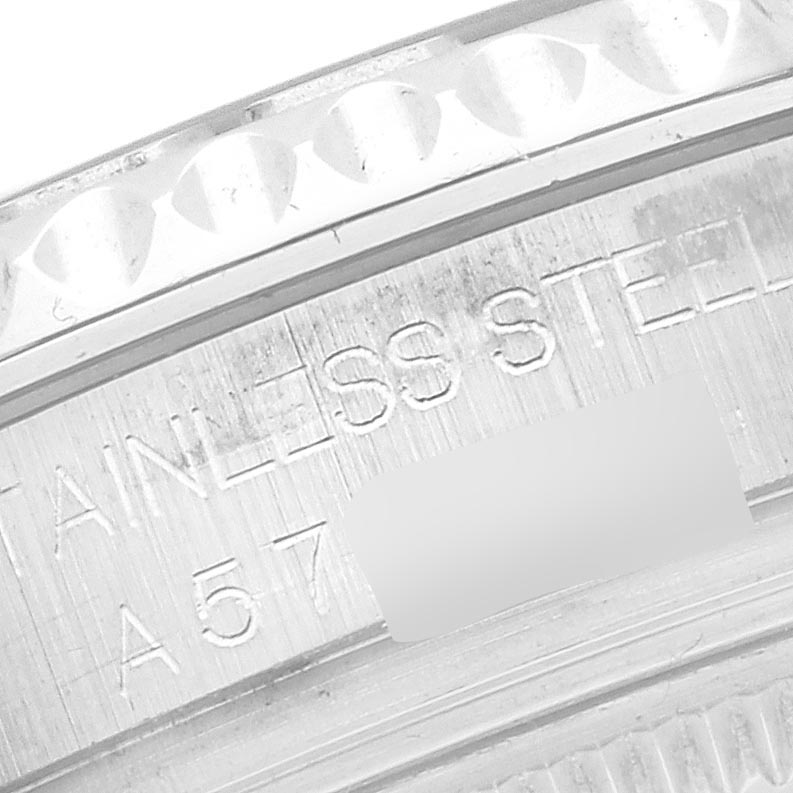 The image shows a close-up of the edge and engravings on the bezel of a Rolex Yacht-Master 168622 Men's Stainless Steel Silver Dial 168622 Men's Stainless Steel Silver Dial watch.