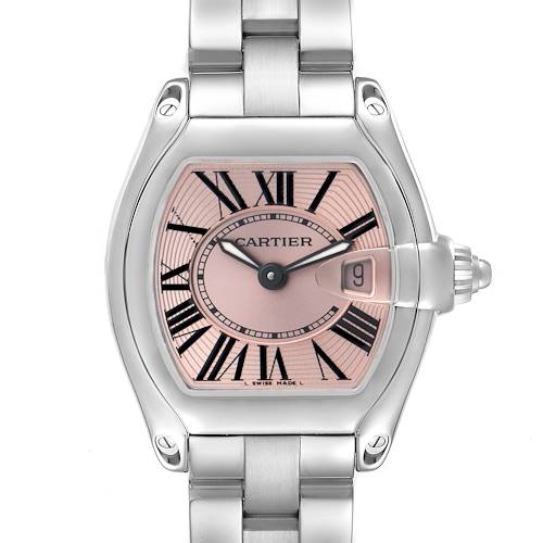 The Cartier Roadster W62017V3 Women's Stainless Steel Pink Dial W62017V3 Women's Stainless Steel Pink Dial watch is shown from a front angle, highlighting its face, Roman numerals, and metal bracelet.