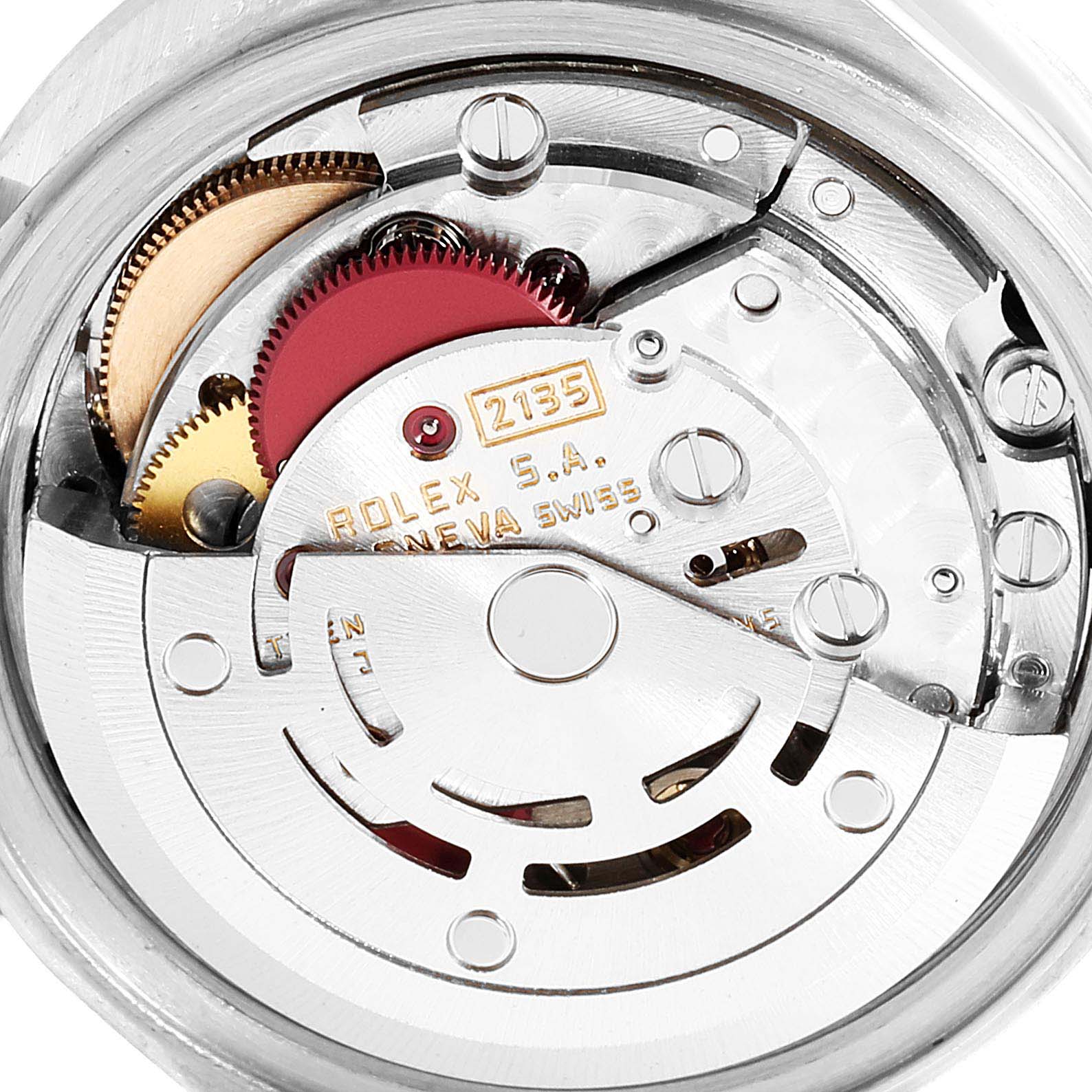 This image shows the intricate internal mechanics of the Rolex Date 69190 Women's Stainless Steel White Dial 69190 Women's Stainless Steel White Dial model watch, focusing on the movement and gears.