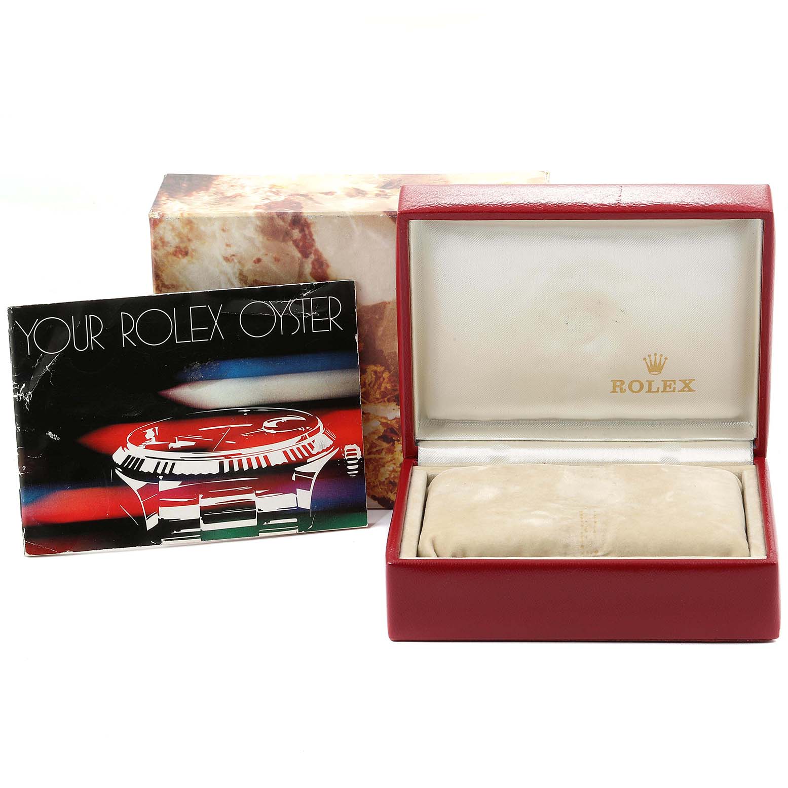 The image shows accessories for a Rolex Date 69190 Women's Stainless Steel White Dial 69190 Women's Stainless Steel White Dial model, including the box and a booklet with "Your Rolex Oyster."