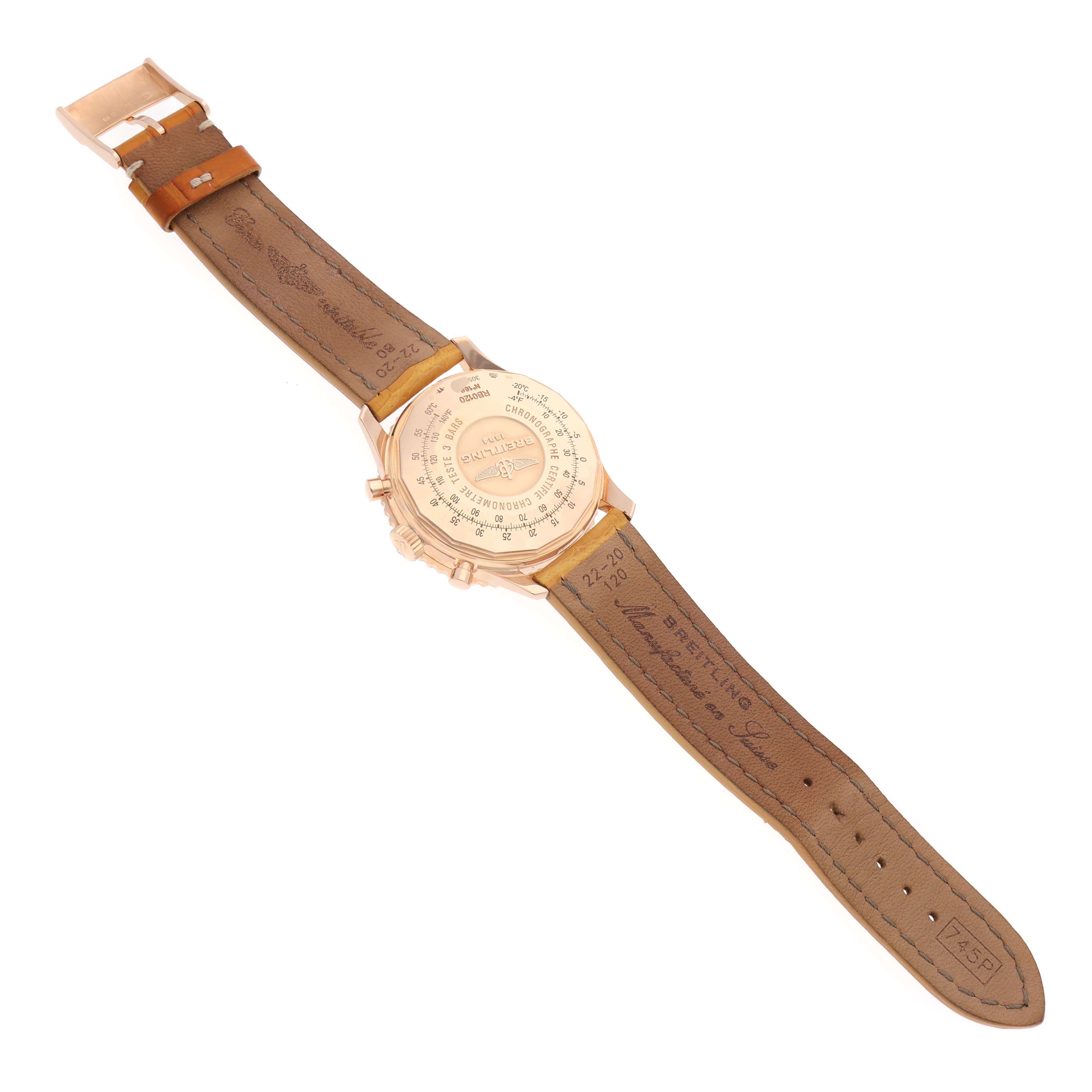 The Breitling Navitimer RB0120 Men's Rose Gold Black Dial RB0120 Men's Rose Gold Black Dial watch is shown from the back, displaying its caseback and leather strap.