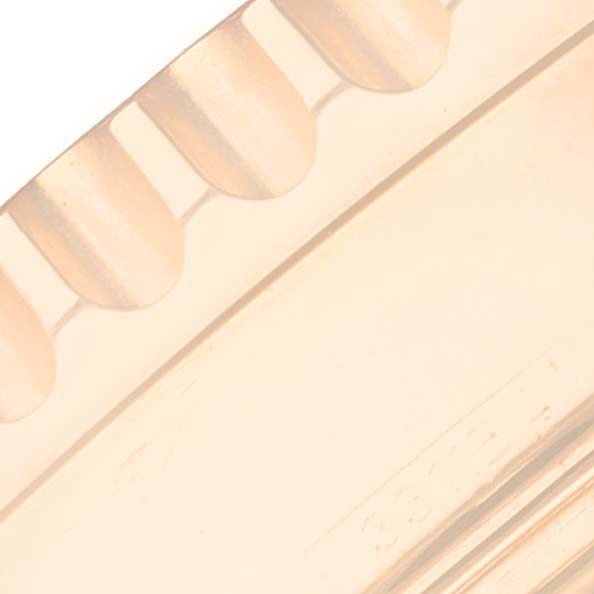 The image shows a close-up angled view of the bezel teeth and edge of the Breitling Navitimer RB0120 Men's Rose Gold Black Dial RB0120 Men's Rose Gold Black Dial watch case.