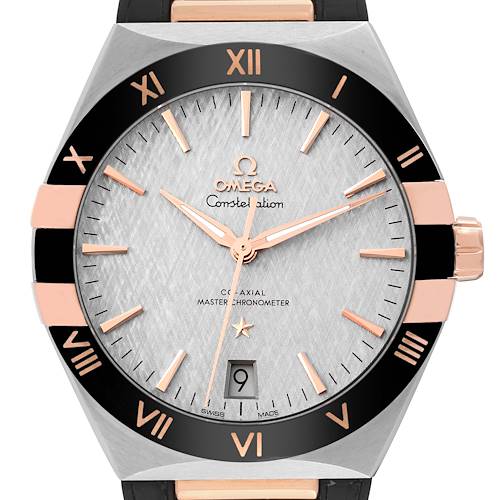 The image shows a close-up front view of an Omega Constellation 131.23.41.21.06.001 Men's Steel and Gold (two tone) Silver Dial 131.23.41.21.06.001 Men's Steel and Gold (two tone) Silver Dial watch, highlighting its dial, hands, bezel, and date window.
