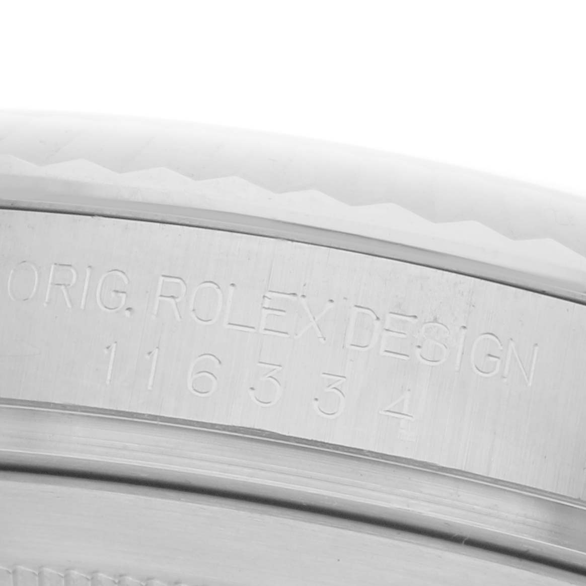 The image shows a close-up of the watch's inner bezel, featuring "Rolex" and model number engraving on the Datejust 41.