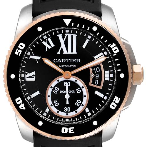 The image shows a front view of the Calibre de Cartier watch by Cartier, highlighting its face, hands, bezel, and date window.