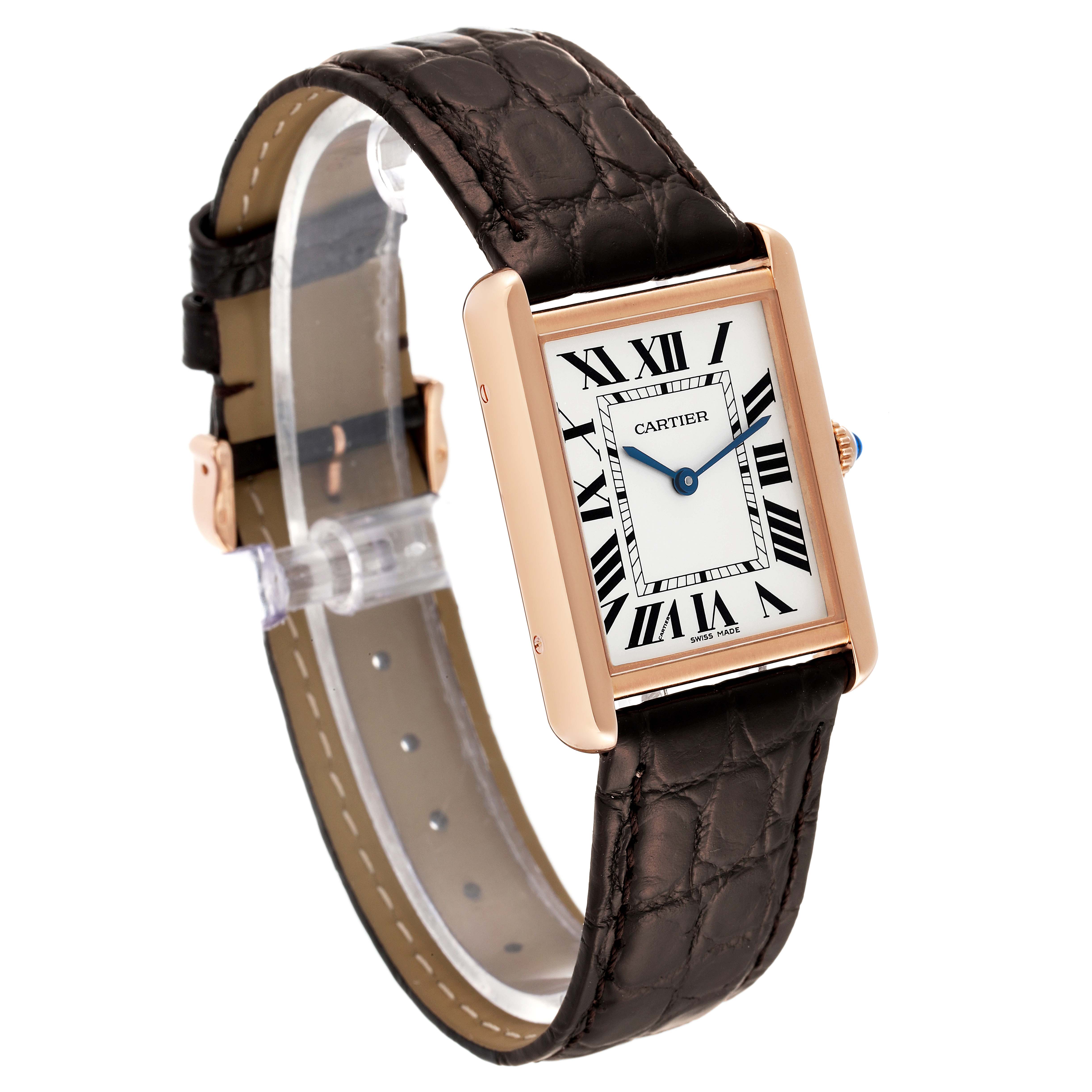 The Cartier Tank Solo W5200025 Men's Rose Gold Silver Dial W5200025 Men's Rose Gold Silver Dial watch is shown at an angled view, highlighting the rectangular dial, Roman numerals, blue hands, and leather strap.