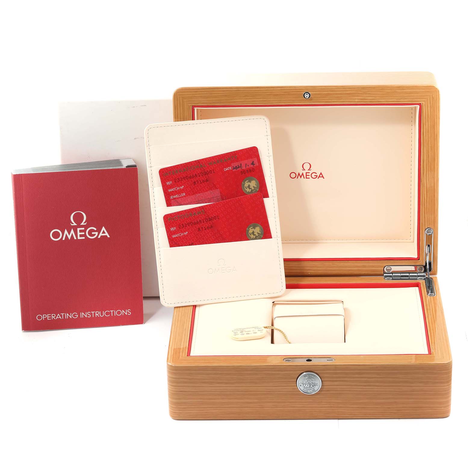 The image shows the packaging, instruction manual, warranty cards, and display box of the Omega Planet Ocean 232.90.46.51.03.001 Men's Titanium Blue Dial 232.90.46.51.03.001 Men's Titanium Blue Dial model watch, shot from above.