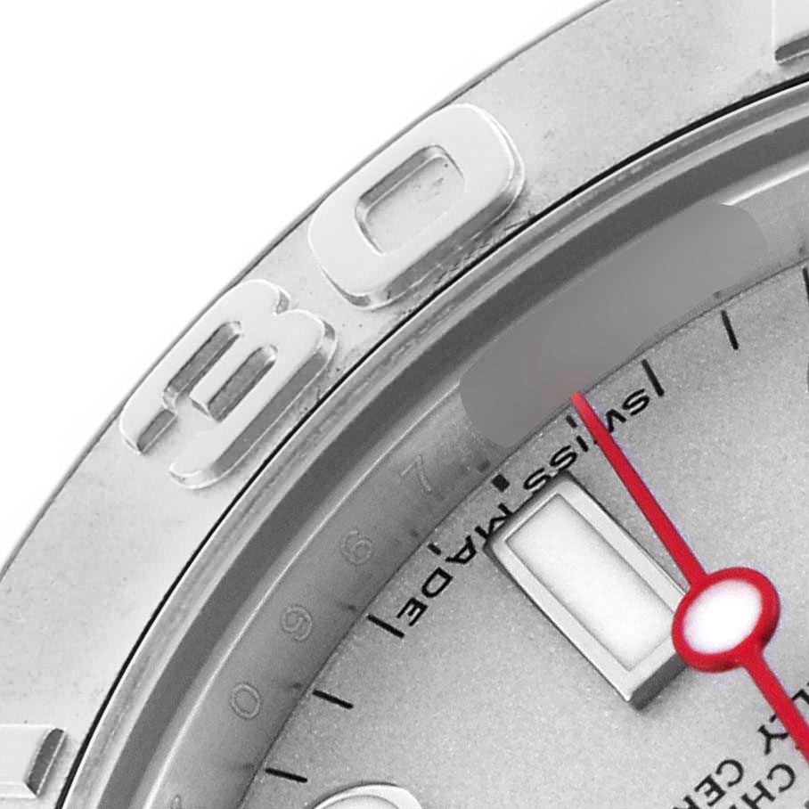 The image shows a close-up of the Rolex Yacht-Master 168622 Men's Stainless Steel Silver Dial 168622 Men's Stainless Steel Silver Dial's bezel, partial dial, and part of the minute and hour markers.