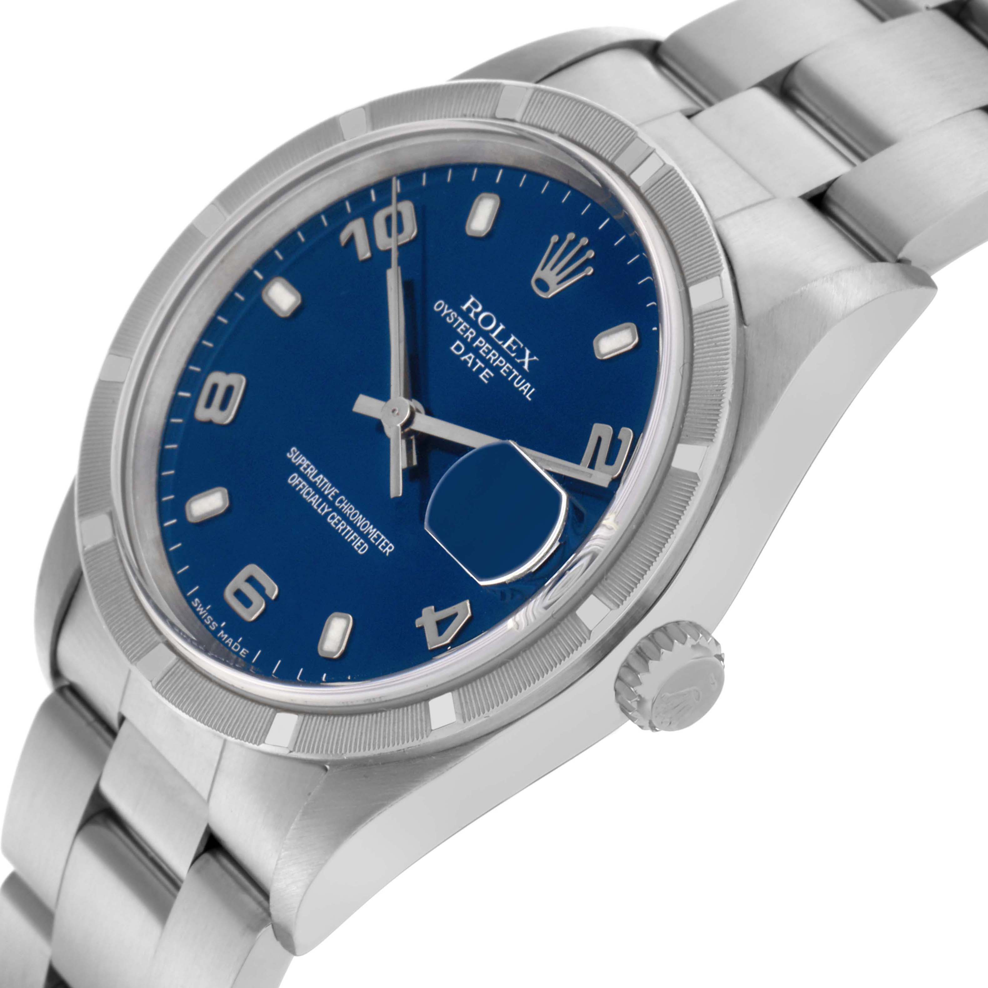 The image shows a Rolex Date 15210 Men's Stainless Steel Blue Dial 15210 Men's Stainless Steel Blue Dial model watch at a three-quarter angle, highlighting the blue dial, crown, and stainless steel bracelet.