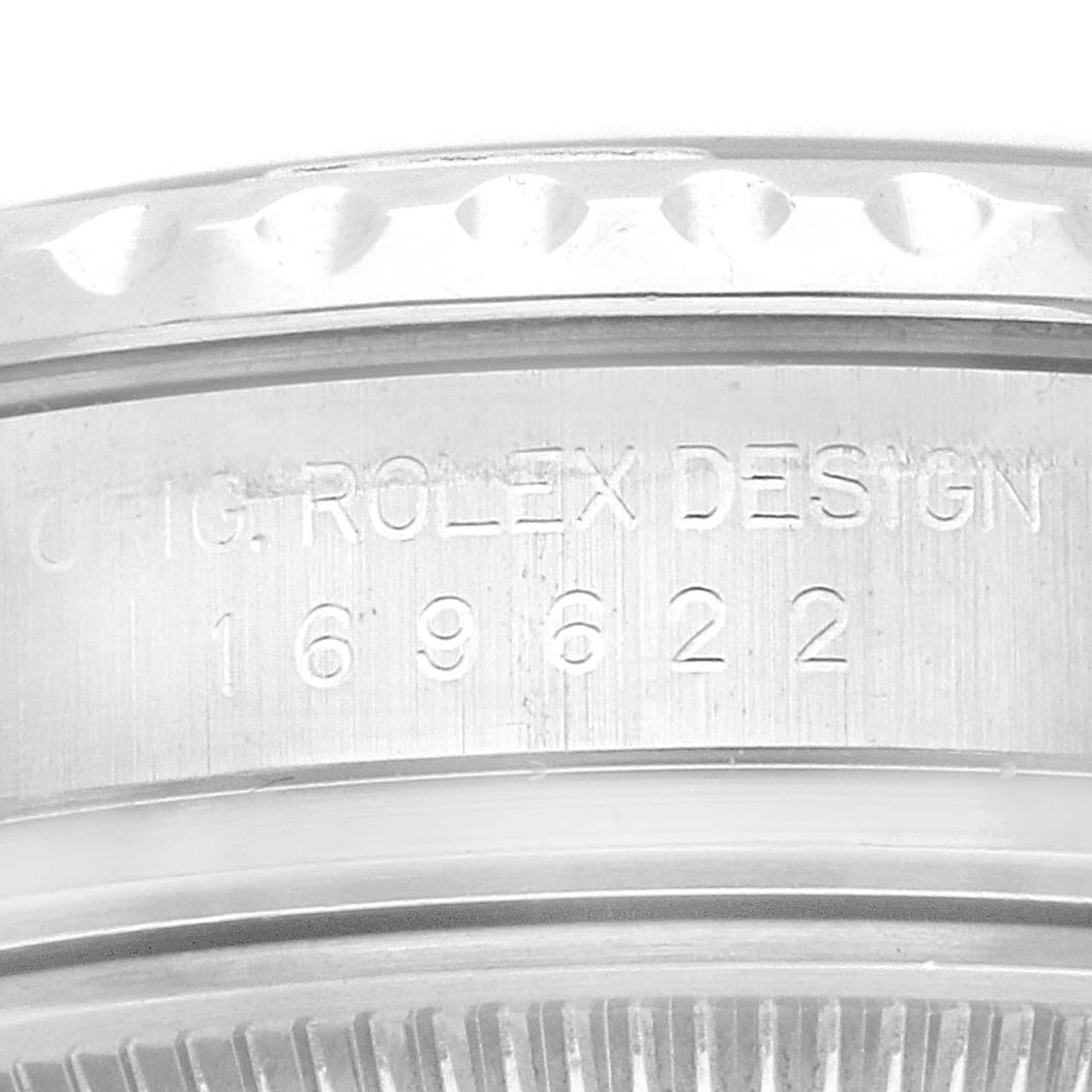 This close-up image shows the engraved case back of a Rolex Yacht-Master 169622 Women's Stainless Steel Silver Dial 169622 Women's Stainless Steel Silver Dial watch.