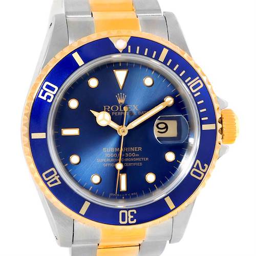 The image shows a front view of a Rolex Submariner 16613 Men's Steel and Gold (two tone) Blue Dial 16613 Men's Steel and Gold (two tone) Blue Dial watch, highlighting its blue dial, two-tone bracelet, and date window.
