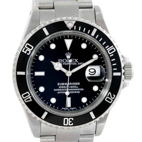 This image shows a front view of the Rolex Submariner 16610 Men's Stainless Steel Black Dial 16610 Men's Stainless Steel Black Dial watch, displaying its dial, bezel, and date magnifier.