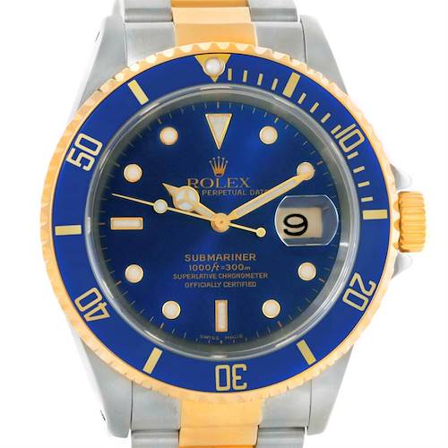 This Rolex Submariner 16613 Men's Steel and Gold (two tone) Blue Dial 16613 Men's Steel and Gold (two tone) Blue Dial watch is shown from a front angle, highlighting its blue dial, gold accents, and stainless steel bracelet.
