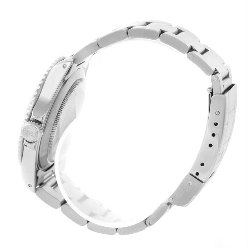 The image shows a side view of the Rolex Submariner 14060 Men's Stainless Steel Black Dial 14060 Men's Stainless Steel Black Dial watch, focusing on its bracelet, case, and crown.