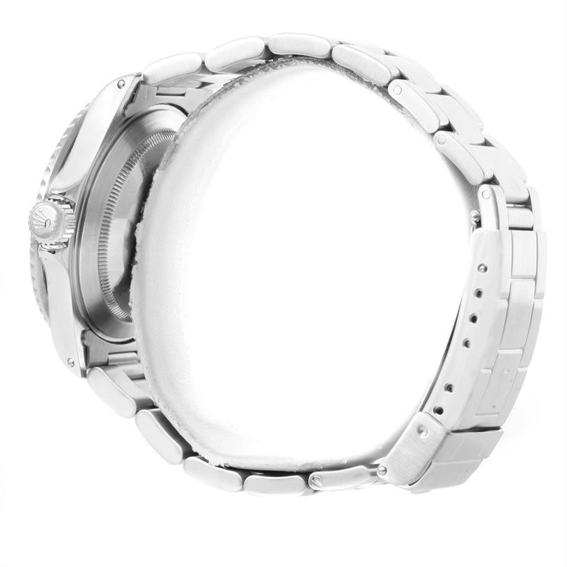 The image shows a side profile of a Rolex Submariner 16610 Men's Stainless Steel Black Dial 16610 Men's Stainless Steel Black Dial watch, highlighting its case, crown, and bracelet.