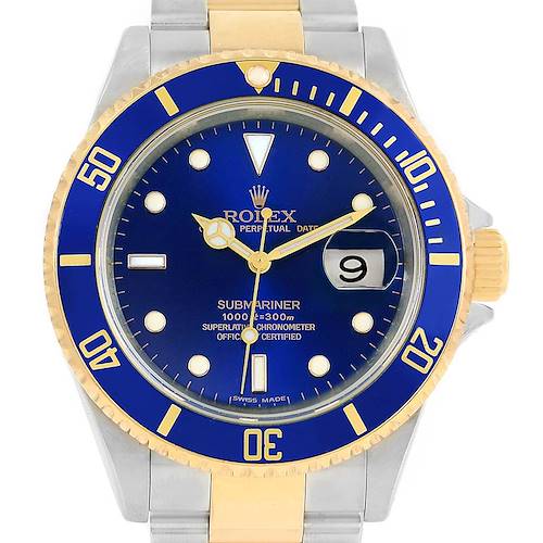 The image shows a front view of a Rolex Submariner 16613 Men's Steel and Gold (two tone) Blue Dial 16613 Men's Steel and Gold (two tone) Blue Dial watch, highlighting its blue and gold bezel, dial, and date window.