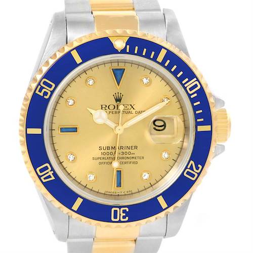 The image shows a Rolex Submariner 16613 Men's Steel and Gold (two tone) Champagne Dial 16613 Men's Steel and Gold (two tone) Champagne Dial watch from a front angle, highlighting its gold dial, blue bezel, and two-tone bracelet.