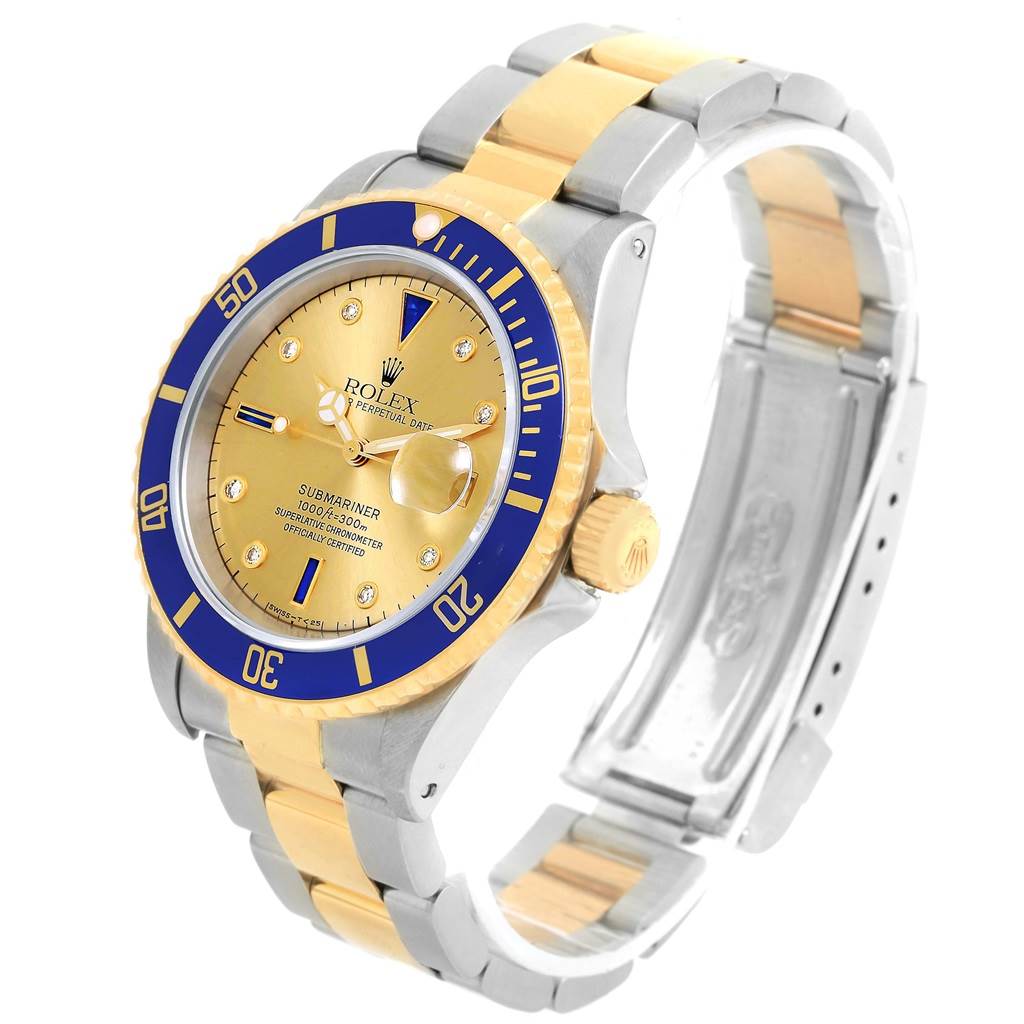 This image shows the Rolex Submariner 16613 Men's Steel and Gold (two tone) Champagne Dial 16613 Men's Steel and Gold (two tone) Champagne Dial watch at a slight angle, highlighting the dial, bezel, and Oyster bracelet.