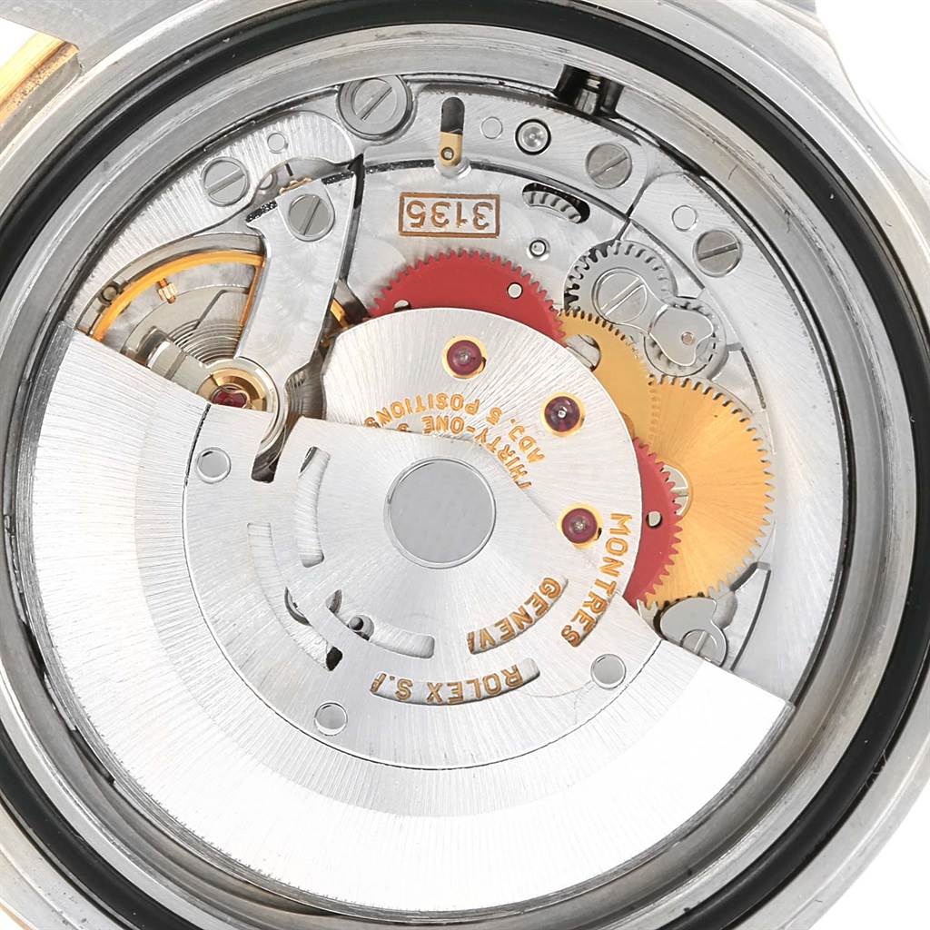 This image shows a close-up view of the internal movement mechanism of a Rolex Submariner 16613 Men's Steel and Gold (two tone) Champagne Dial 16613 Men's Steel and Gold (two tone) Champagne Dial watch.