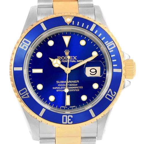 The image shows a frontal view of a Rolex Submariner 16613 Men's Steel and Gold (two tone) Blue Dial 16613 Men's Steel and Gold (two tone) Blue Dial watch, highlighting its blue dial, bezel, and two-tone bracelet.