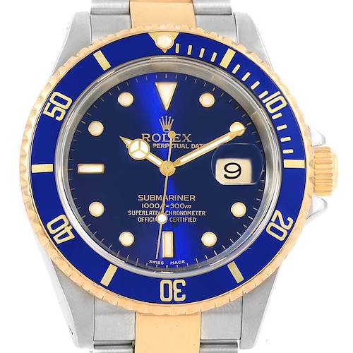 This image shows a Rolex Submariner 16613 Men's Steel and Gold (two tone) Blue Dial 16613 Men's Steel and Gold (two tone) Blue Dial watch with a blue dial and bezel, gold and steel accents, and the date display at 3 o'clock.