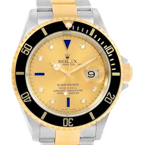 This image shows a front view of a Rolex Submariner 16613 Men's Steel and Gold (two tone) Champagne Dial 16613 Men's Steel and Gold (two tone) Champagne Dial with a black bezel, gold and steel bracelet, and date display.