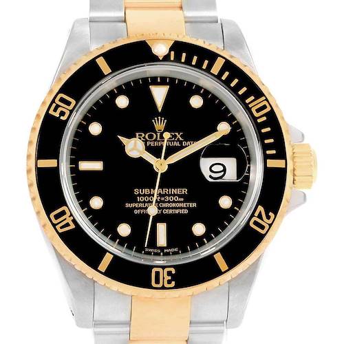 This image shows a frontal view of a Rolex Submariner 16613 Men's Steel and Gold (two tone) Black Dial 16613 Men's Steel and Gold (two tone) Black Dial watch, highlighting its black dial, gold bezel, and two-tone bracelet.