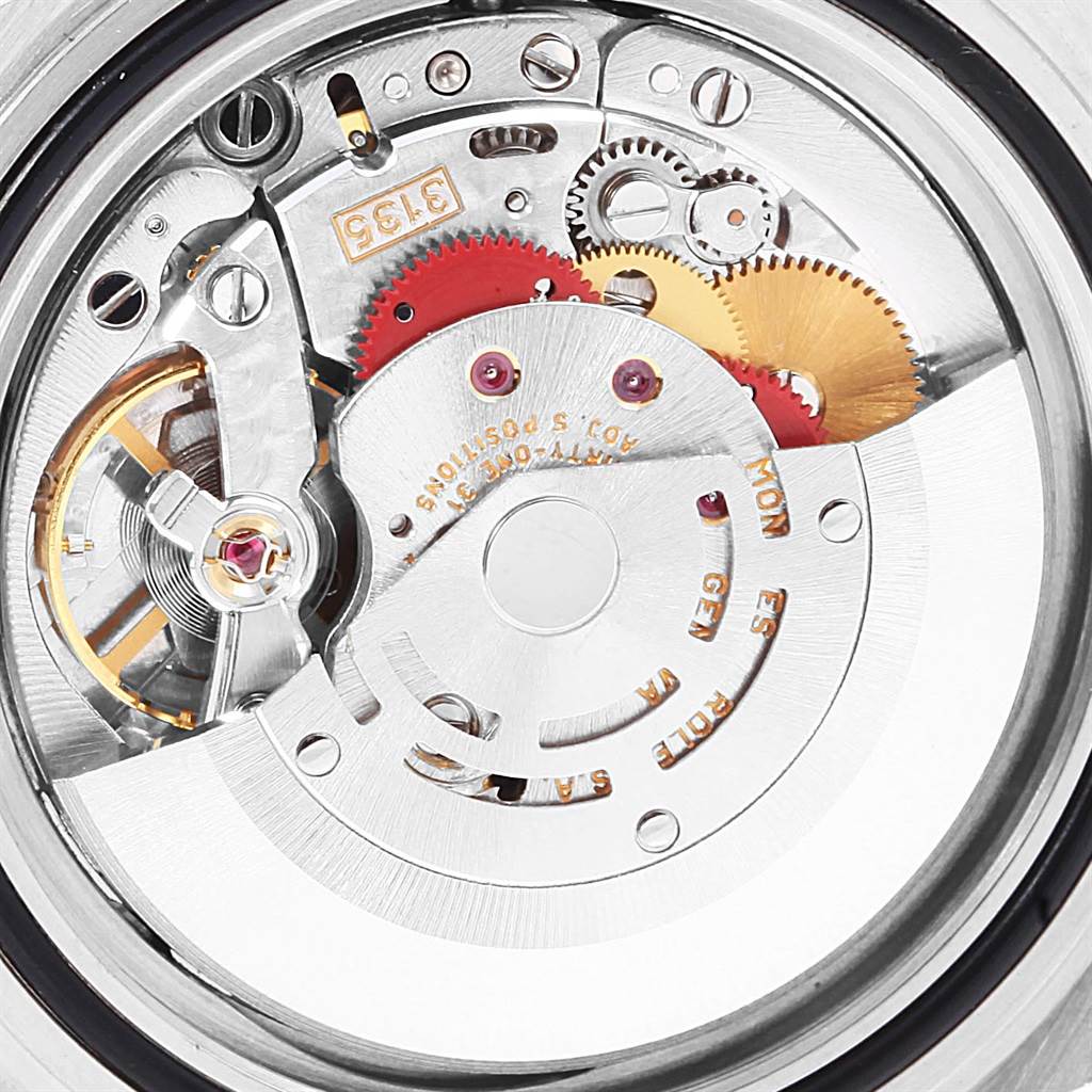 This image shows the intricate inner mechanics of the Rolex Submariner 16613 Men's Steel and Gold (two tone) Blue Dial 16613 Men's Steel and Gold (two tone) Blue Dial watch movement from a back view angle.