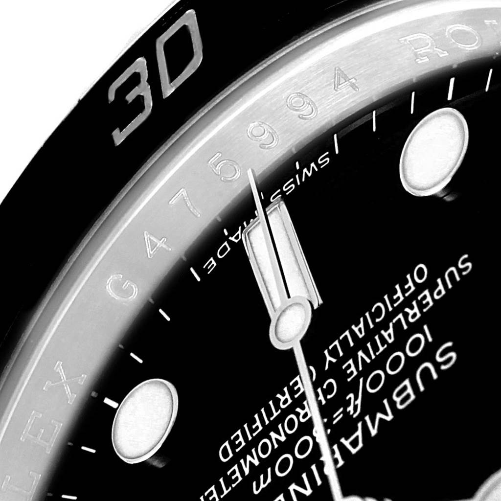 The image shows a close-up of the dial and bezel edge of a Rolex Submariner 116610 Men's Stainless Steel Black Dial 116610 Men's Stainless Steel Black Dial watch, highlighting the detailed markings.