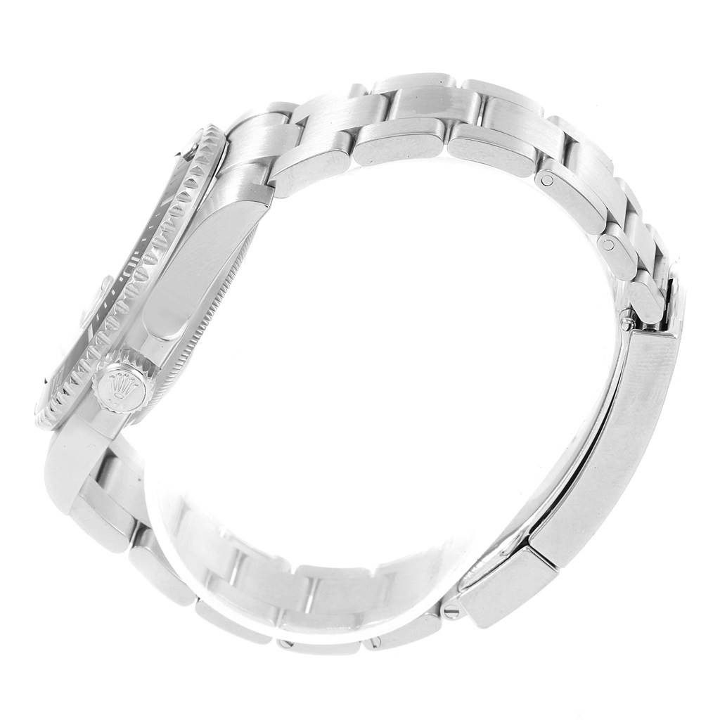 This image shows a side view of the Rolex Submariner 116610 Men's Stainless Steel Black Dial 116610 Men's Stainless Steel Black Dial watch highlighting its crown, case, and bracelet.