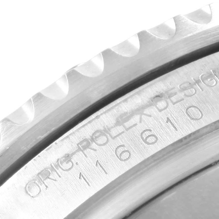 This close-up image shows the engraved case back of a Rolex Submariner 116610 Men's Stainless Steel Black Dial 116610 Men's Stainless Steel Black Dial watch.