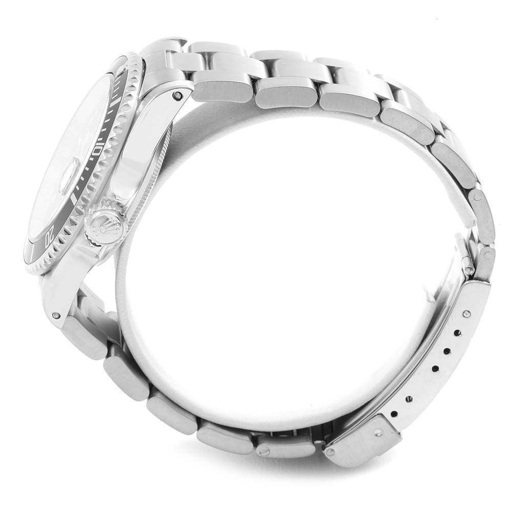 The Rolex Submariner 16610 Men's Stainless Steel Black Dial 16610 Men's Stainless Steel Black Dial watch is shown from a side angle, highlighting its bezel, crown, and metal bracelet.