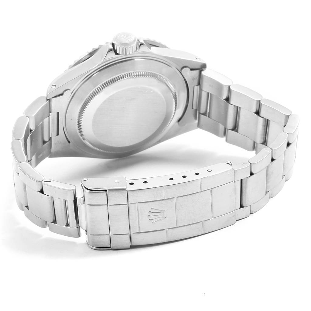 The image shows the back case and bracelet of the Rolex Submariner 16610 Men's Stainless Steel Black Dial 16610 Men's Stainless Steel Black Dial watch at an angle.