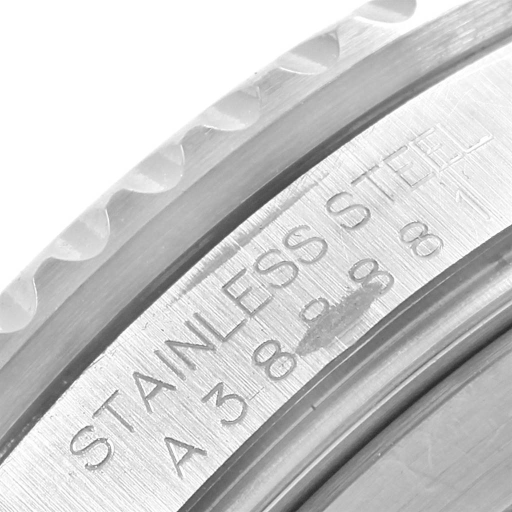 This image shows a close-up of the side engraving on the stainless steel case of a Rolex Submariner 16610 Men's Stainless Steel Black Dial 16610 Men's Stainless Steel Black Dial watch.
