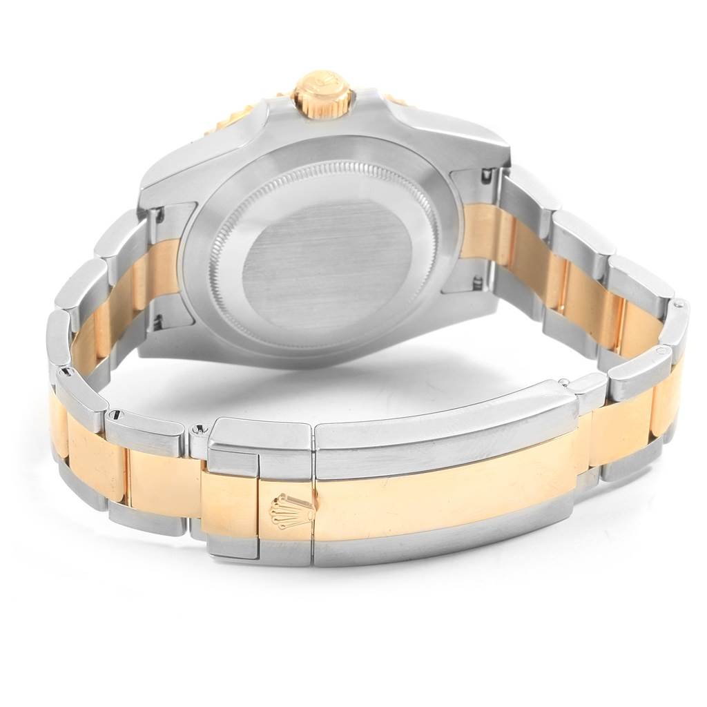 This image shows the back case and clasp of the Rolex Submariner 116613 Men's Steel and Gold (two tone) Blue Dial 116613 Men's Steel and Gold (two tone) Blue Dial watch, highlighting its two-tone metal bracelet.