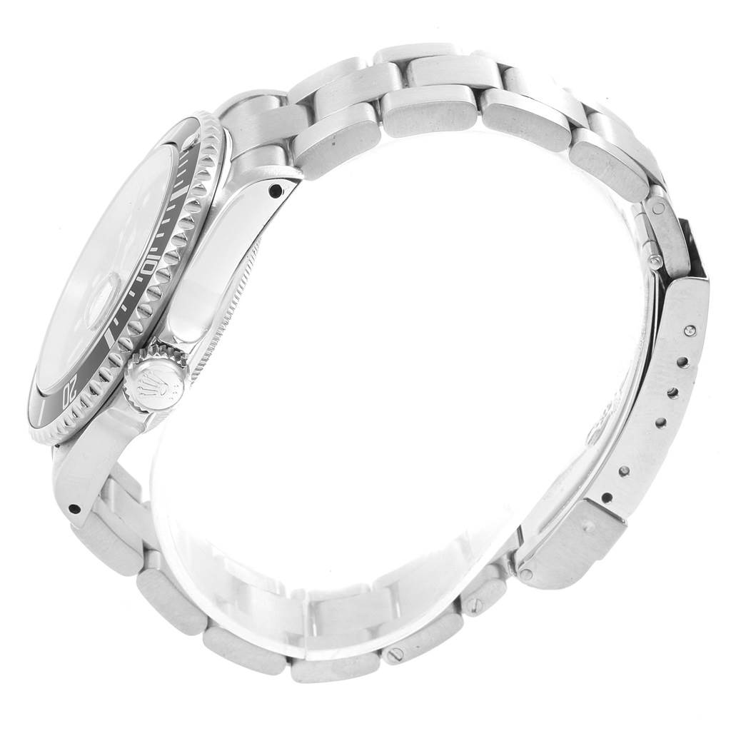 This image shows a side view of the Rolex Submariner 16610 Men's Stainless Steel Black Dial 16610 Men's Stainless Steel Black Dial watch, focusing on its case, bracelet, and clasp.