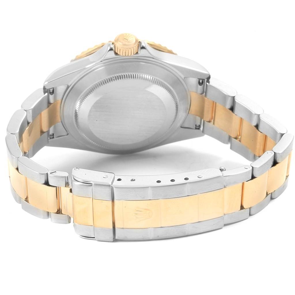 The image shows the back and bracelet of a Rolex Submariner 16613 Men's Steel and Gold (two tone) Blue Dial 16613 Men's Steel and Gold (two tone) Blue Dial watch at a rear angle.