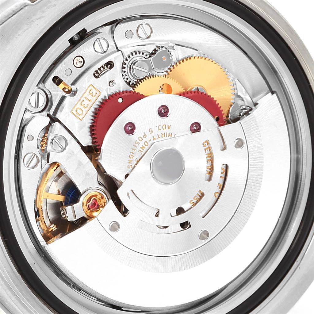 The image shows the internal mechanism and movement of a Rolex Submariner 114060 Men's Stainless Steel Black Dial 114060 Men's Stainless Steel Black Dial watch from a close-up, rear angle.