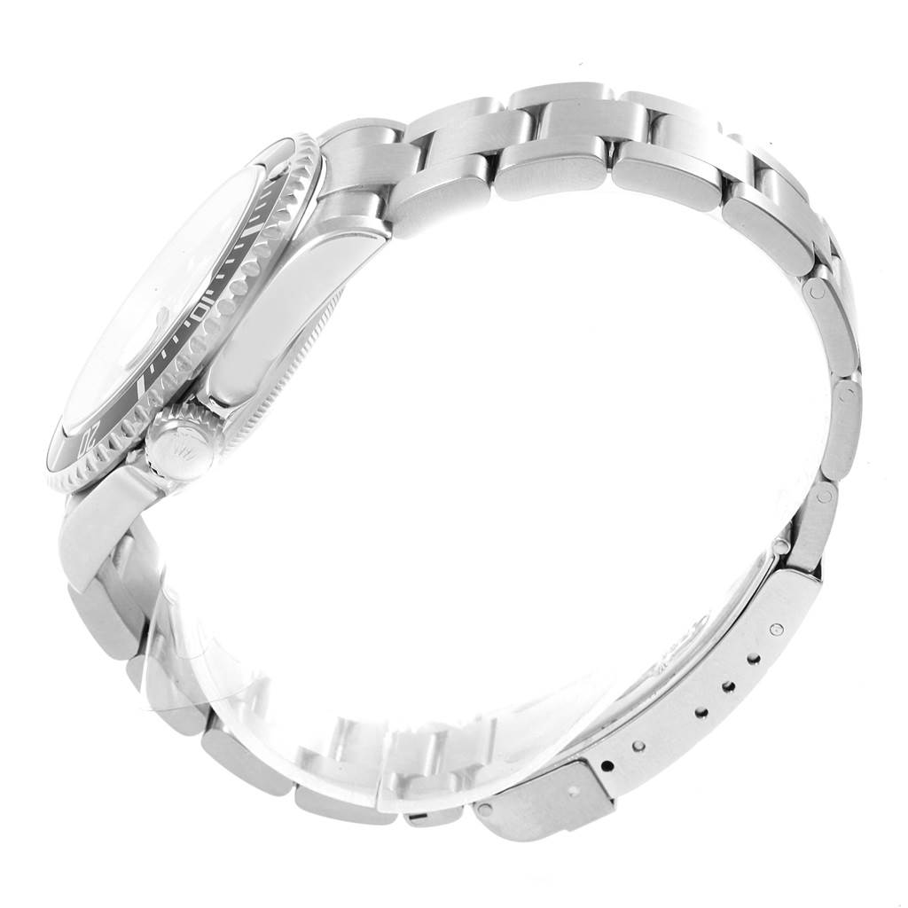 The image shows a side view of a Rolex Submariner 16610 Men's Stainless Steel Black Dial 16610 Men's Stainless Steel Black Dial watch focusing on its stainless steel bracelet and crown.