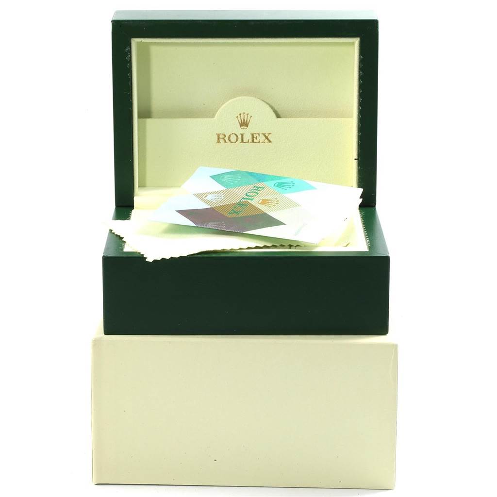 This image shows the open box and protective pouch for the Rolex Submariner 16613 Men's Steel and Gold (two tone) Grey Dial 16613 Men's Steel and Gold (two tone) Grey Dial, including documentation.