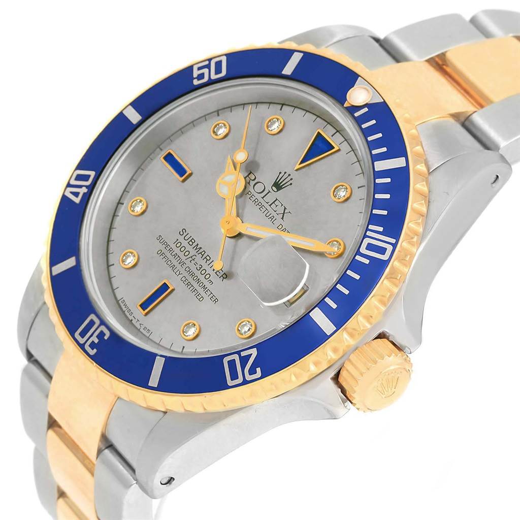 This image shows a close-up of the Rolex Submariner 16613 Men's Steel and Gold (two tone) Grey Dial 16613 Men's Steel and Gold (two tone) Grey Dial, highlighting its face, bezel, crown, and part of the bracelet.