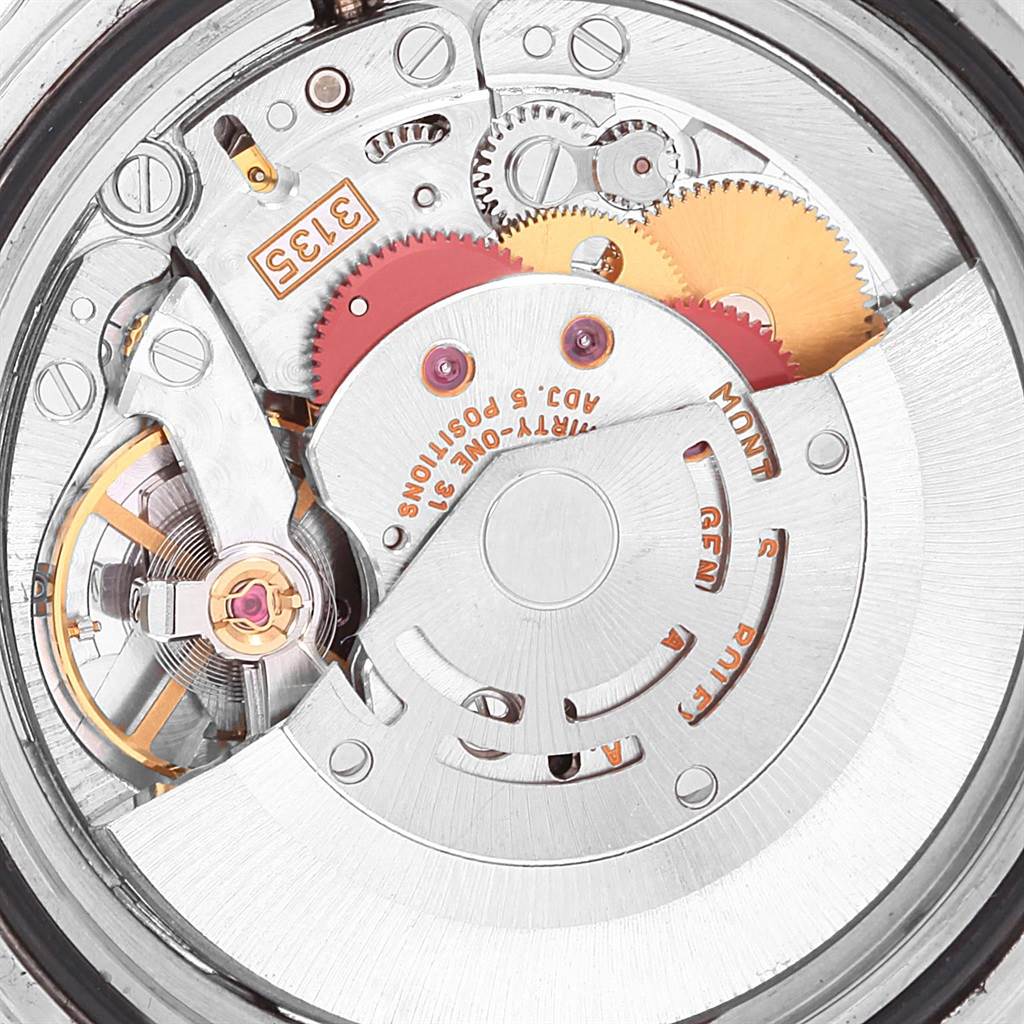 This image shows the intricate internal movement and gears of the Rolex Submariner 16613 Men's Steel and Gold (two tone) Grey Dial 16613 Men's Steel and Gold (two tone) Grey Dial watch model.