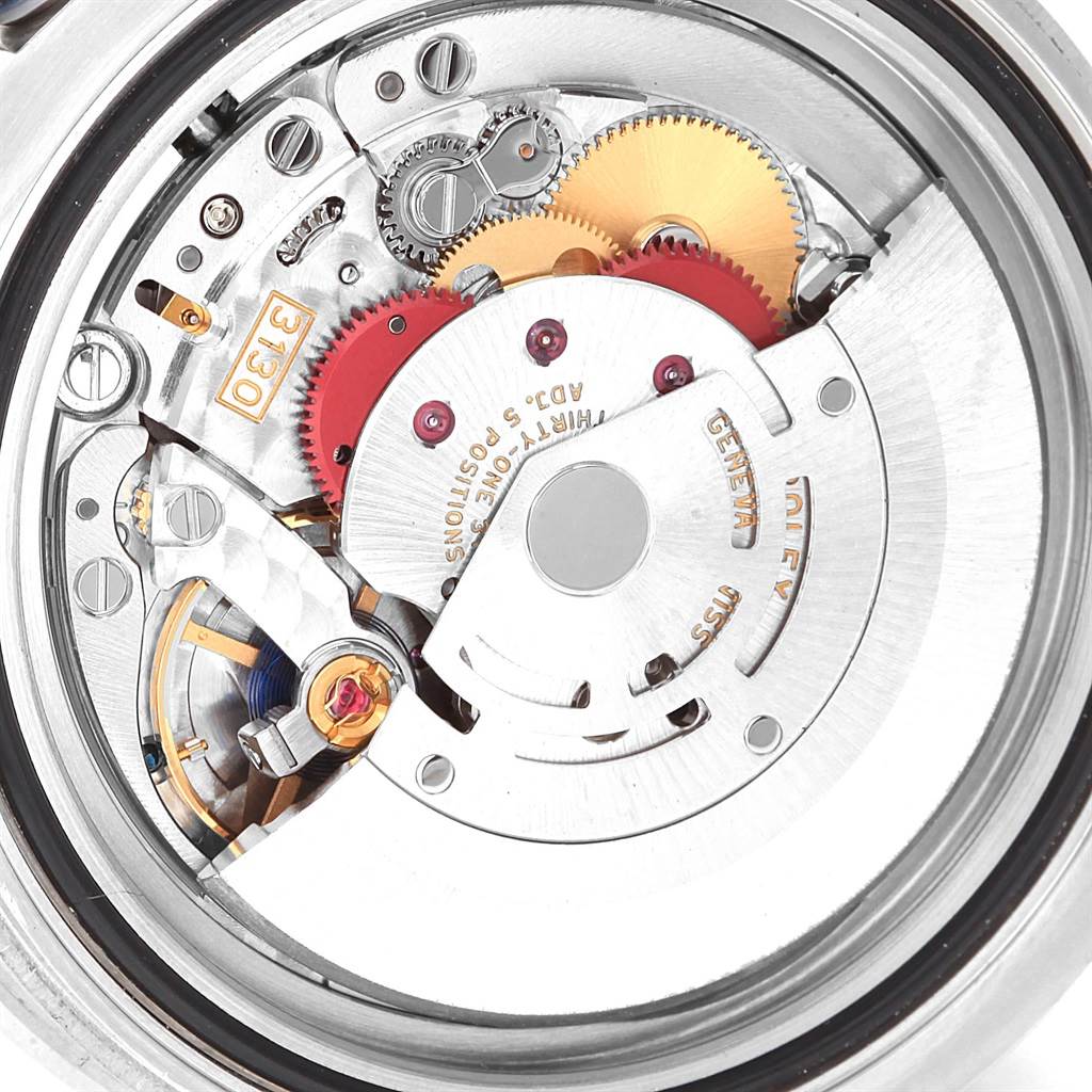 The image shows the internal mechanical movement of a Rolex Submariner 114060 Men's Stainless Steel Black Dial 114060 Men's Stainless Steel Black Dial watch from a top-down angle.